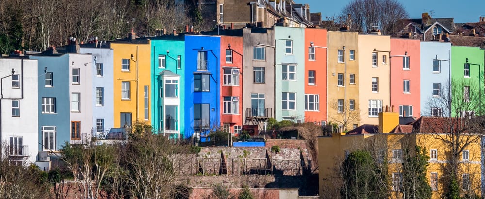 Row of colourful terraced houses in Bristol, representing the local housing market and first-time buyer mortgage opportunities in Bristol.